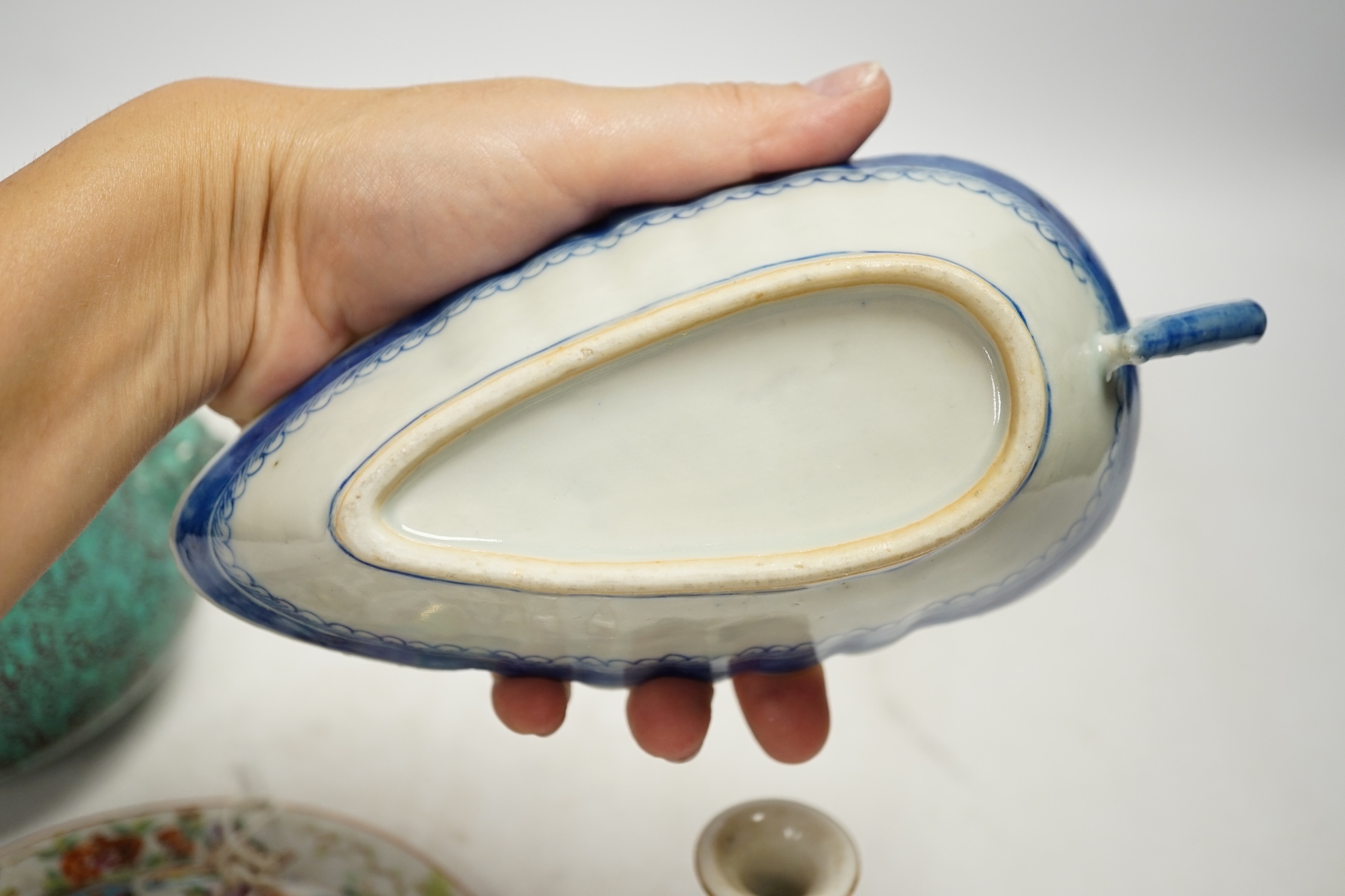 A Chinese robin’s egg glazed censer, a blue and white sauce boat and two famille rose items, largest 17cm diameter. Condition - fair to good